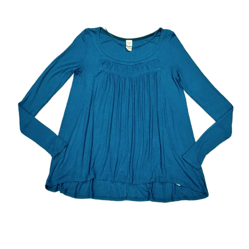 women's tops for those who want to add a pop of color to their outfitsTop Long Sleeve By We The Free In Teal, Size: S