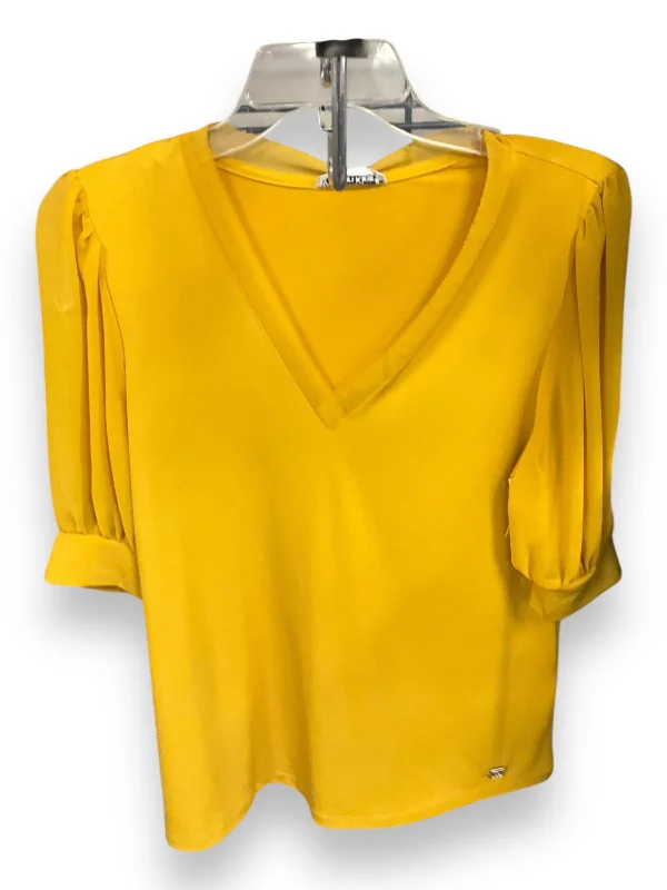 women's tops for those who love to dress up their casual looks with stylish topsTop Short Sleeve By Calvin Klein In Gold, Size: S