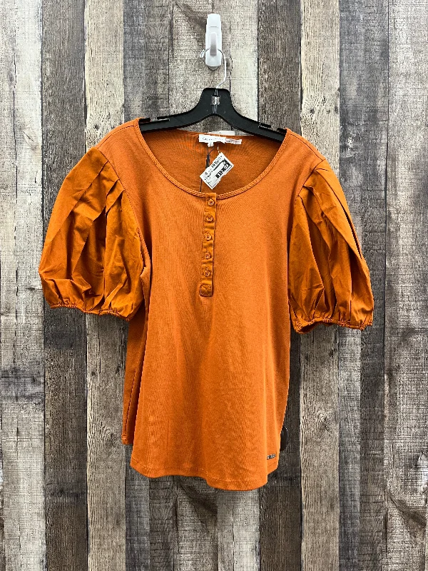 women's tops for those who love to dress up their casual looks with stylish topsTop Short Sleeve By Calvin Klein In Orange, Size: L